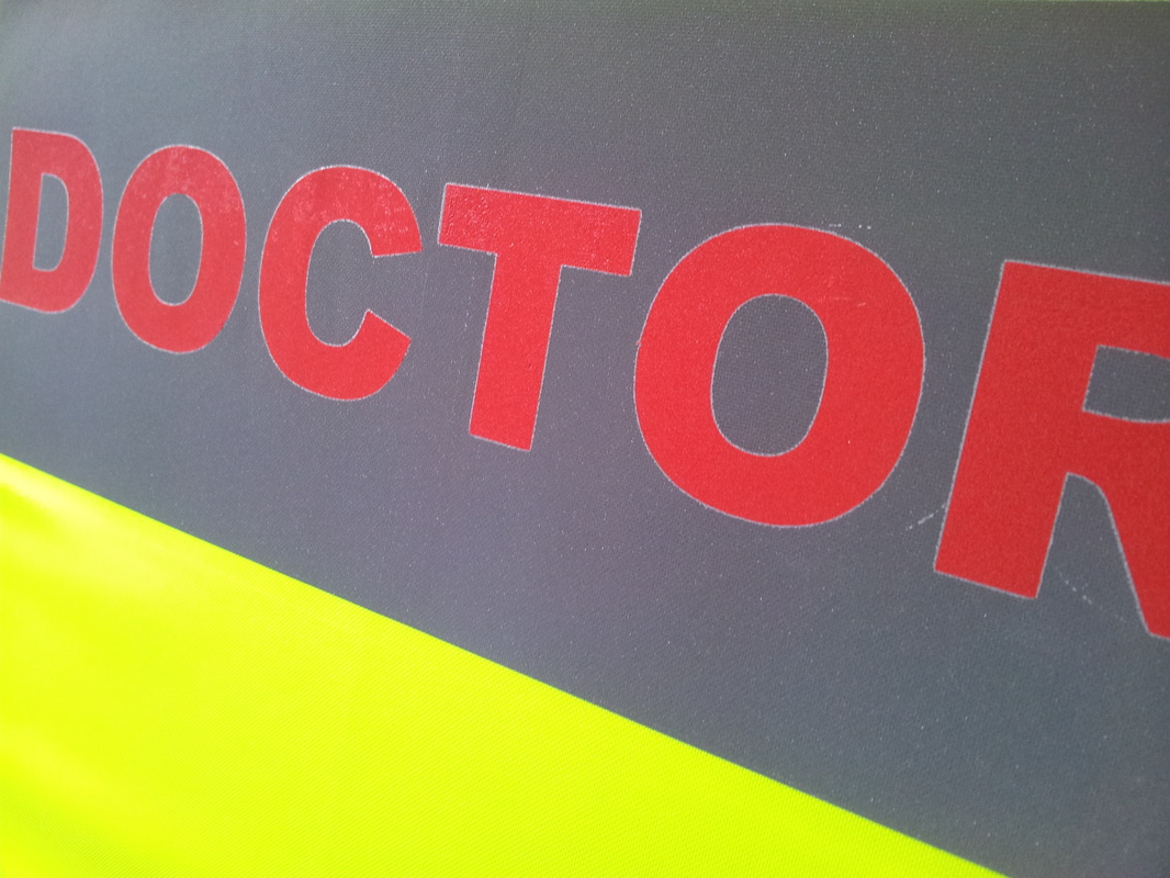 Red reflective text was used for NHS Scotland's custom reflective jackets for night safety