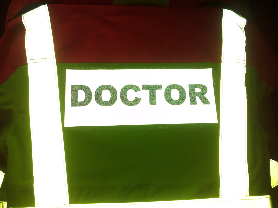NHS Jackets show at night time. Our reflective logo print service helps the doctors stand out and stay safe.