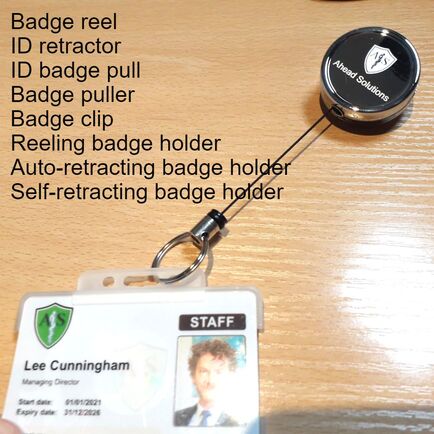 Badge reel ID retractor ID badge pull Badge puller Badge clip Reeling badge holder Auto-retracting badge holder Self-retracting badge holder are all pseudonyms.